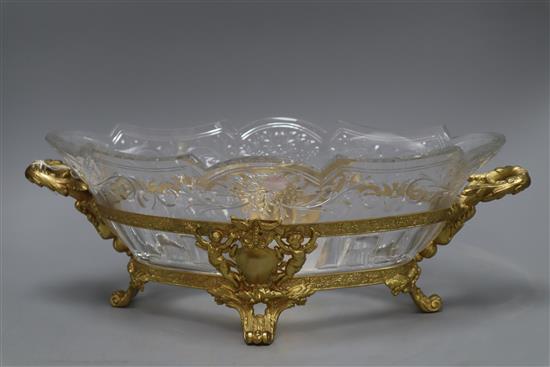 A cut glass bowl on ormolu stand, overall length 42cm